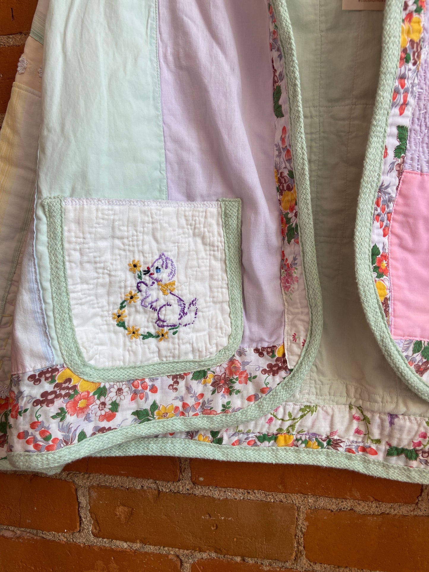 Kitten and succulent quilt jacket