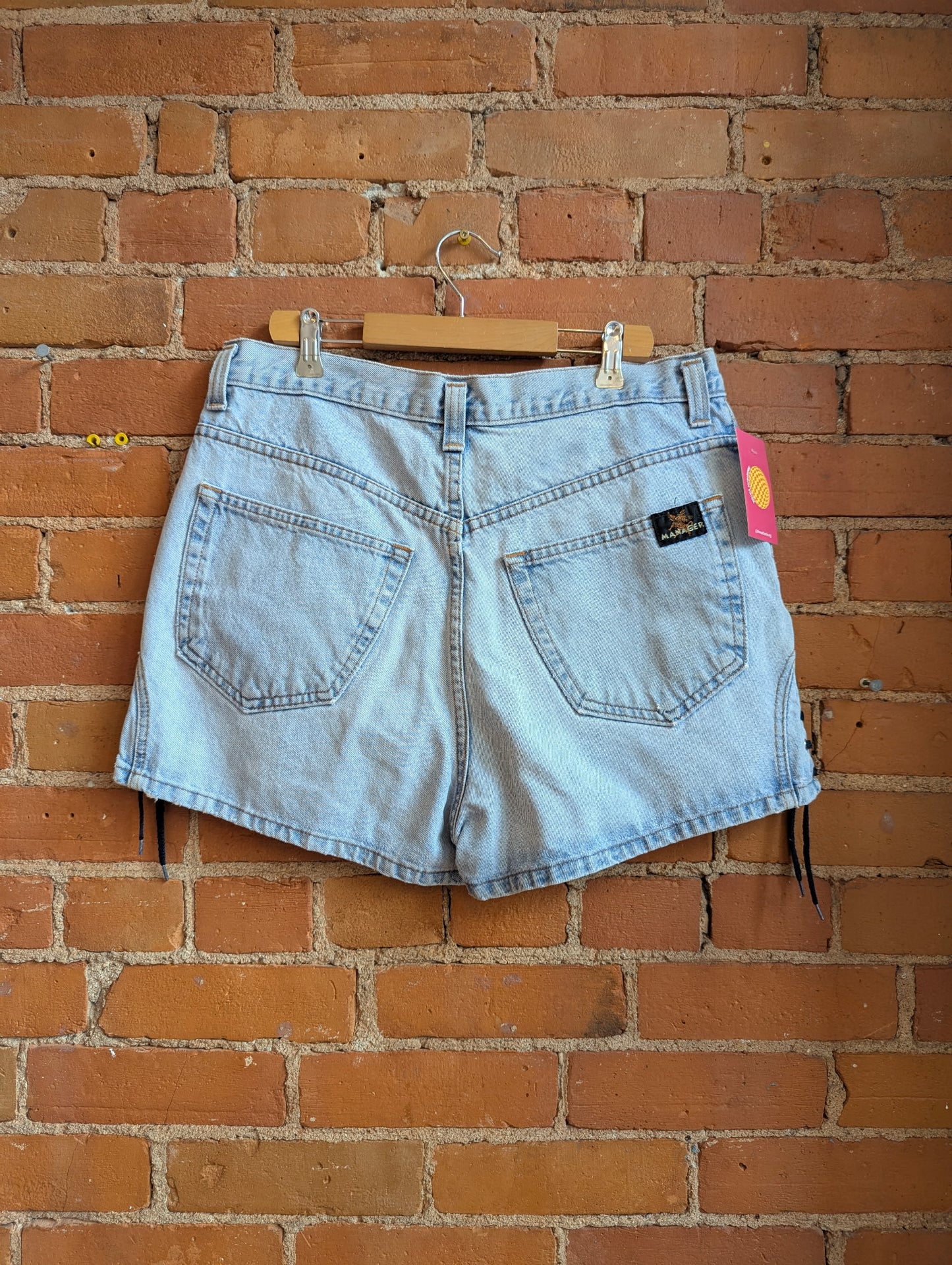 1990s Manager Light Wash Denim Shorts With Button Fly and Lace Up Details