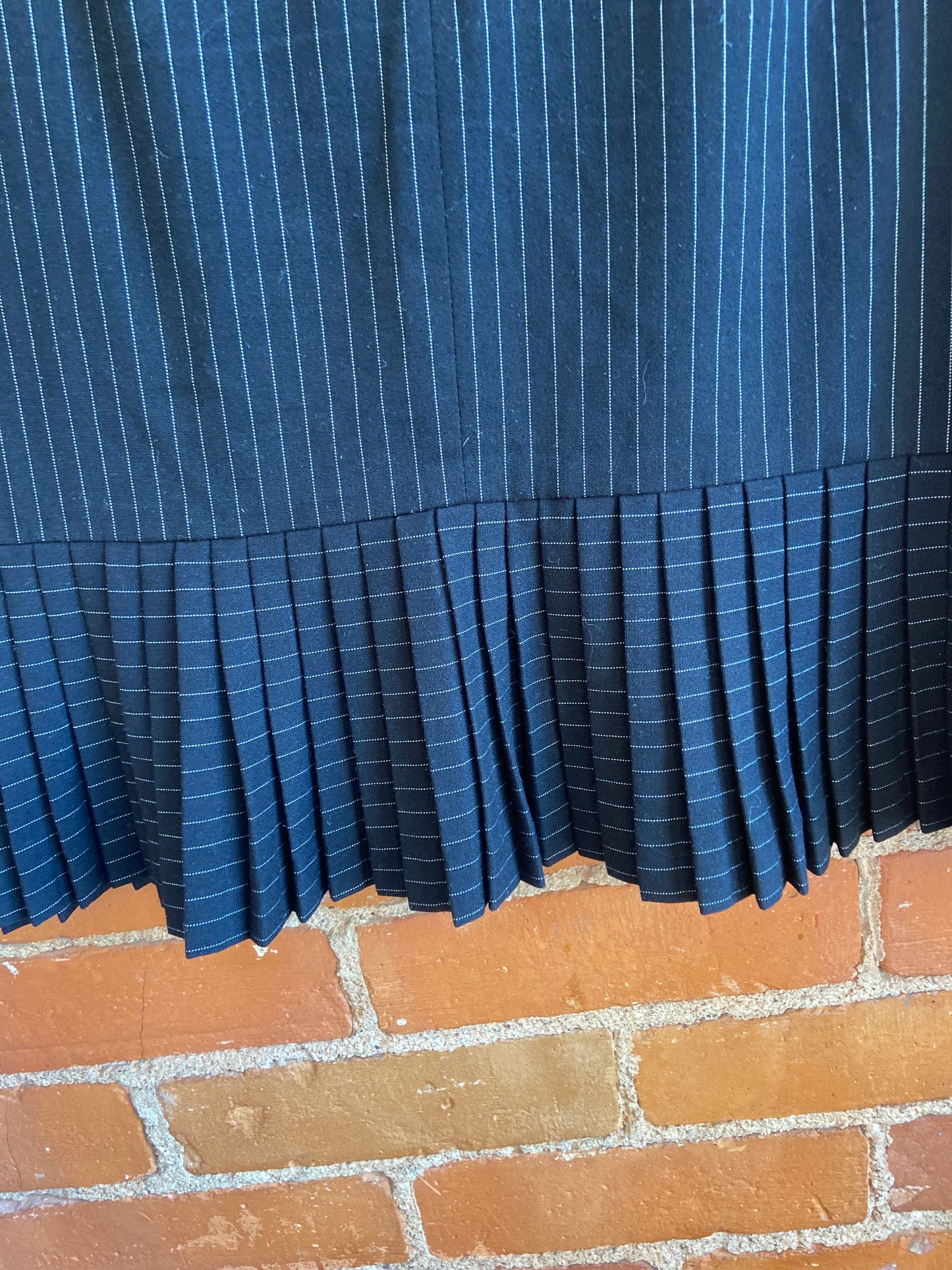 Black Pinstripe Skirt With Pleated Bottom
