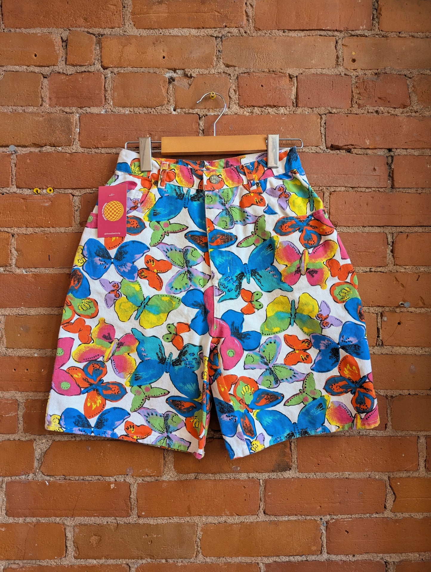 1990s Colors and Co. White Longline Denim Shorts With Multicolored Butterfly Print