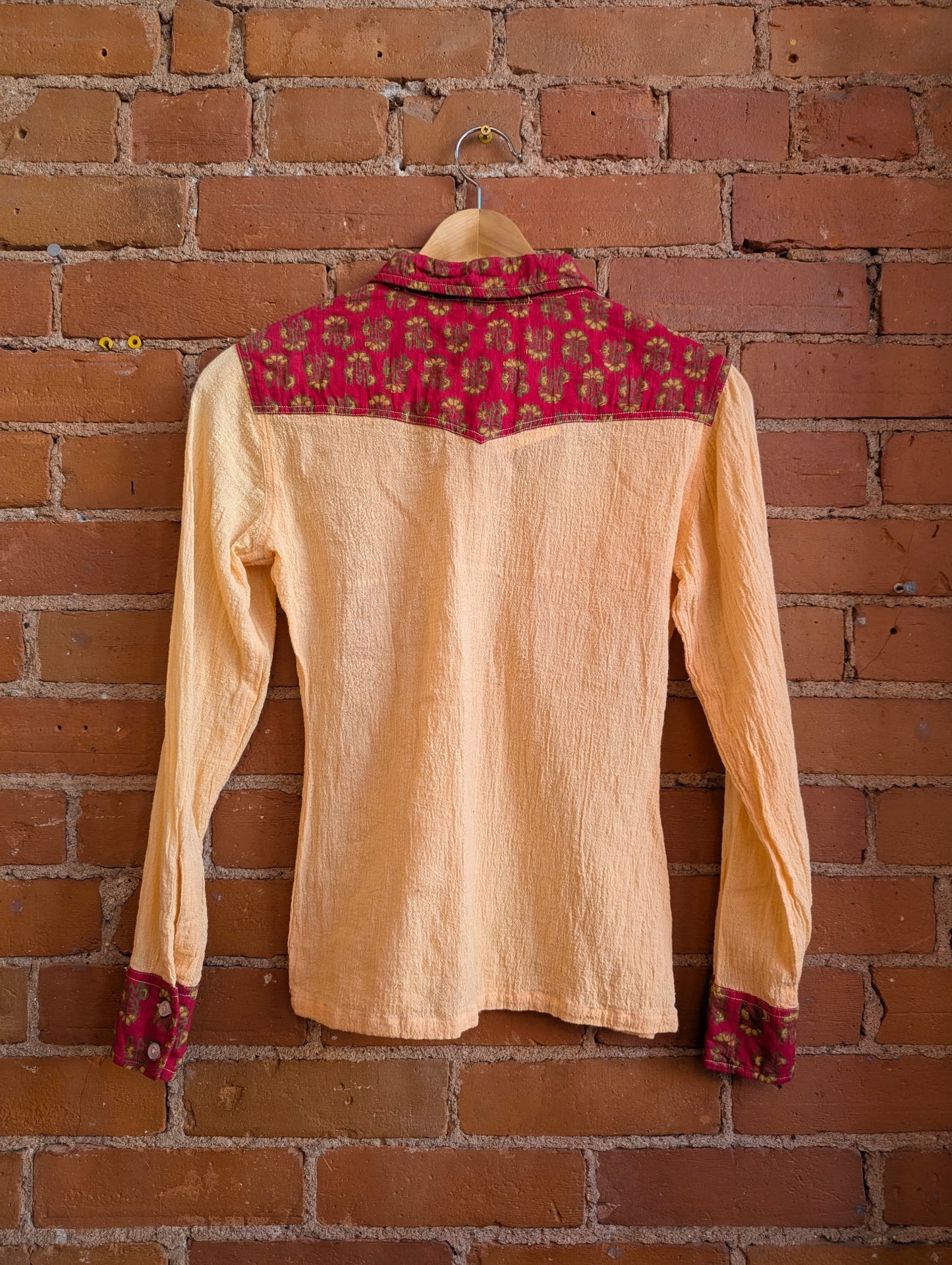 1970s India Overseas Trading Co. Peach Gauze Shirt With Floral Print Accents