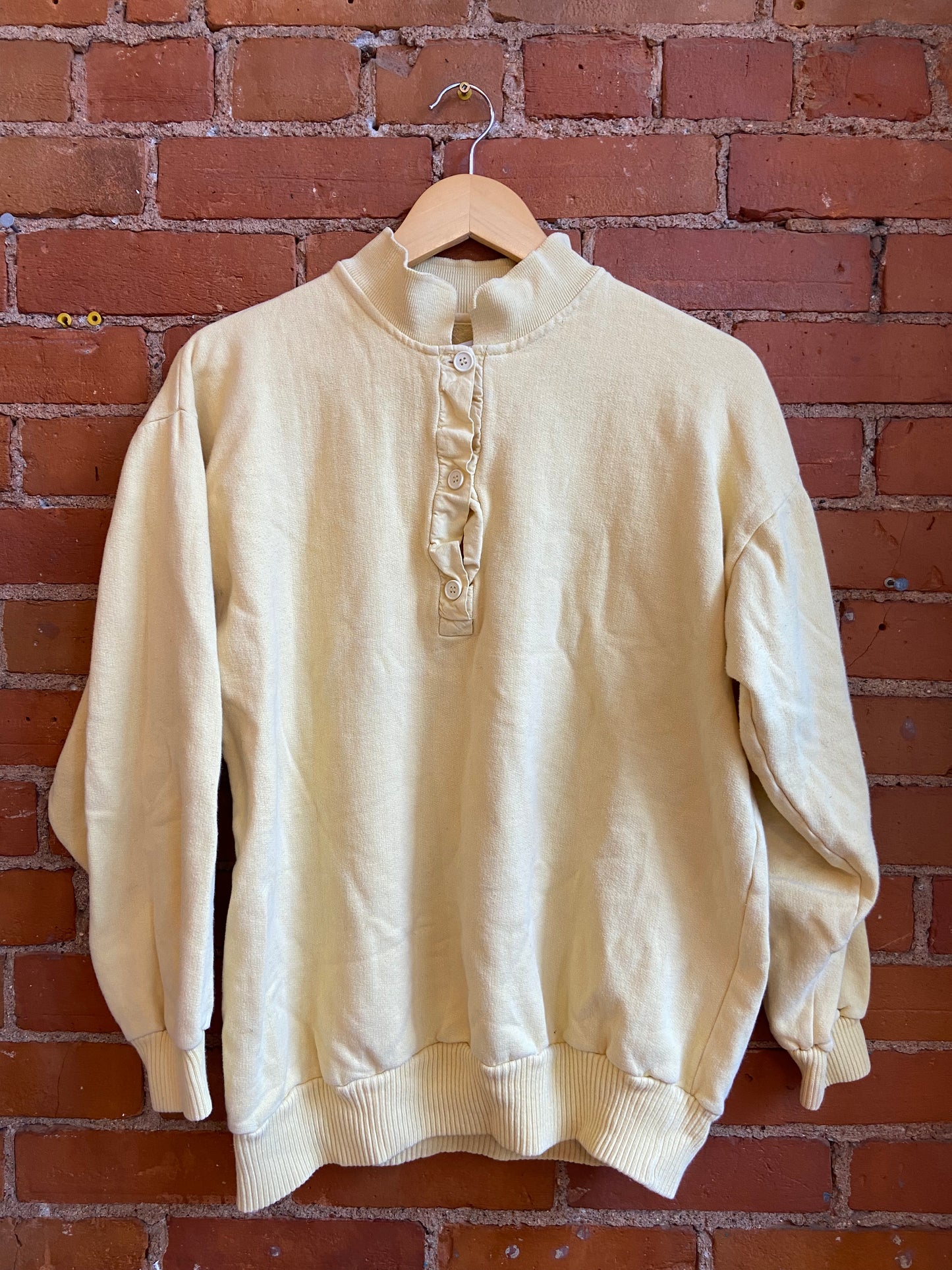 Light Yellow Sweater with Buttons up Front