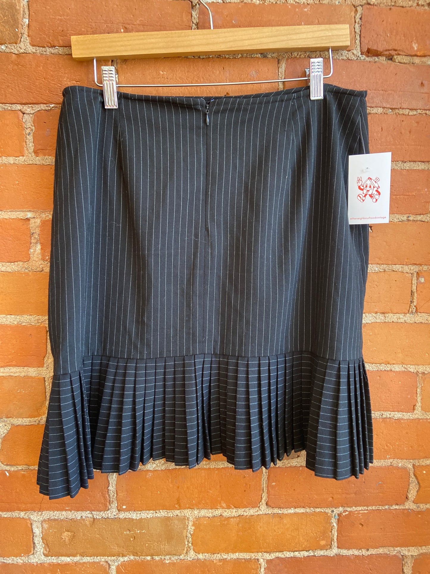 Black Pinstripe Skirt With Pleated Bottom
