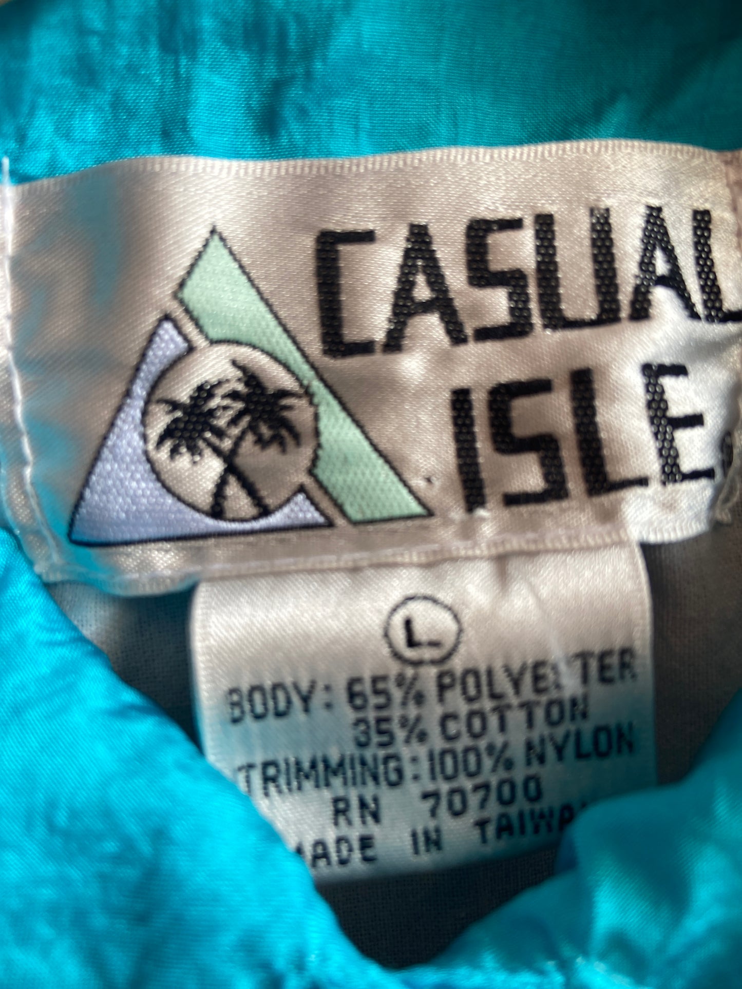 1980s Casual Isle White Polo Shirt With Blue, Yellow, Green and Pink Accents