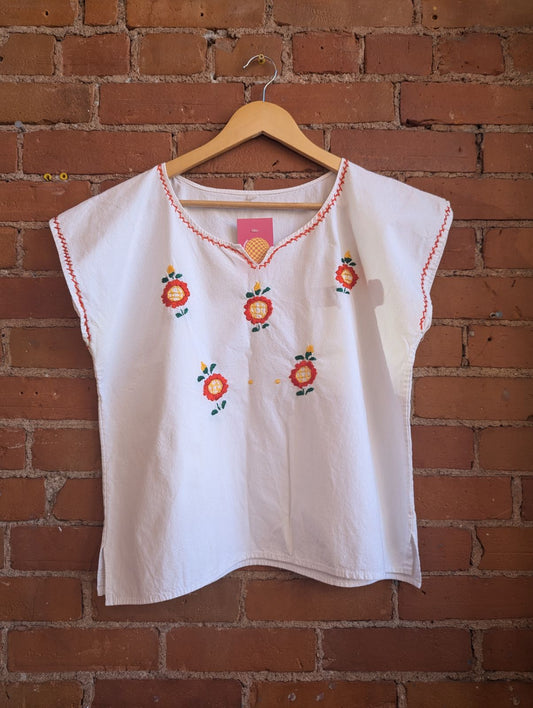 White Cotton V-Neck Blouse With Hand-Embroidered Orange and Yellow Flowers